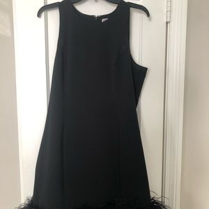 Black cocktail dress with feather details